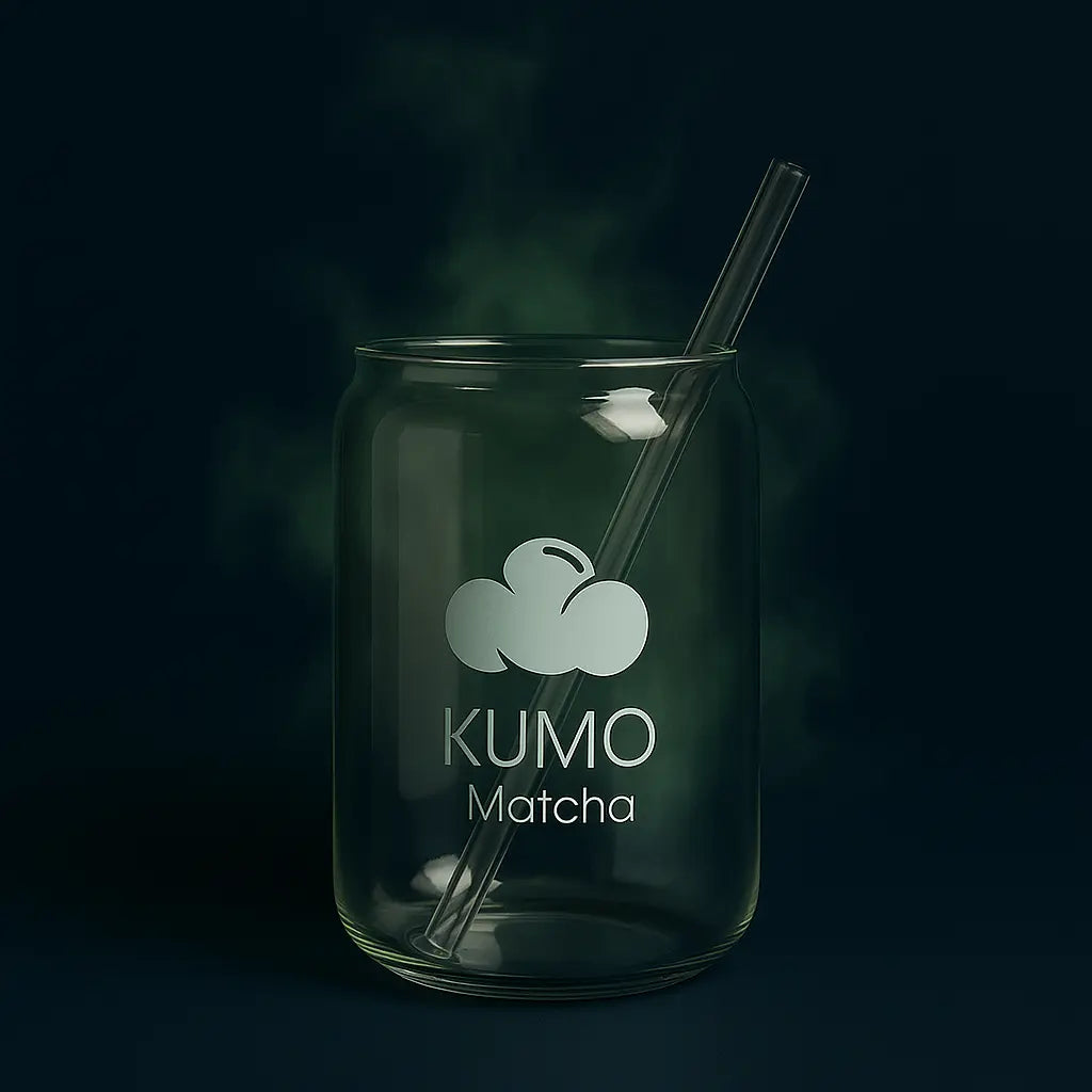 Clear glass jar with 'KUMO Matcha' branding and a straw on a dark background