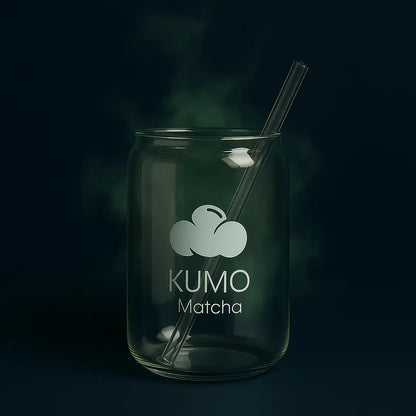 Clear glass jar with 'KUMO Matcha' branding and a straw on a dark background